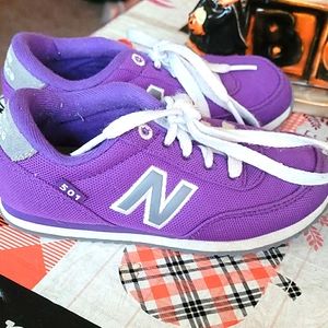 2 pairs of new balance  tennis shoes